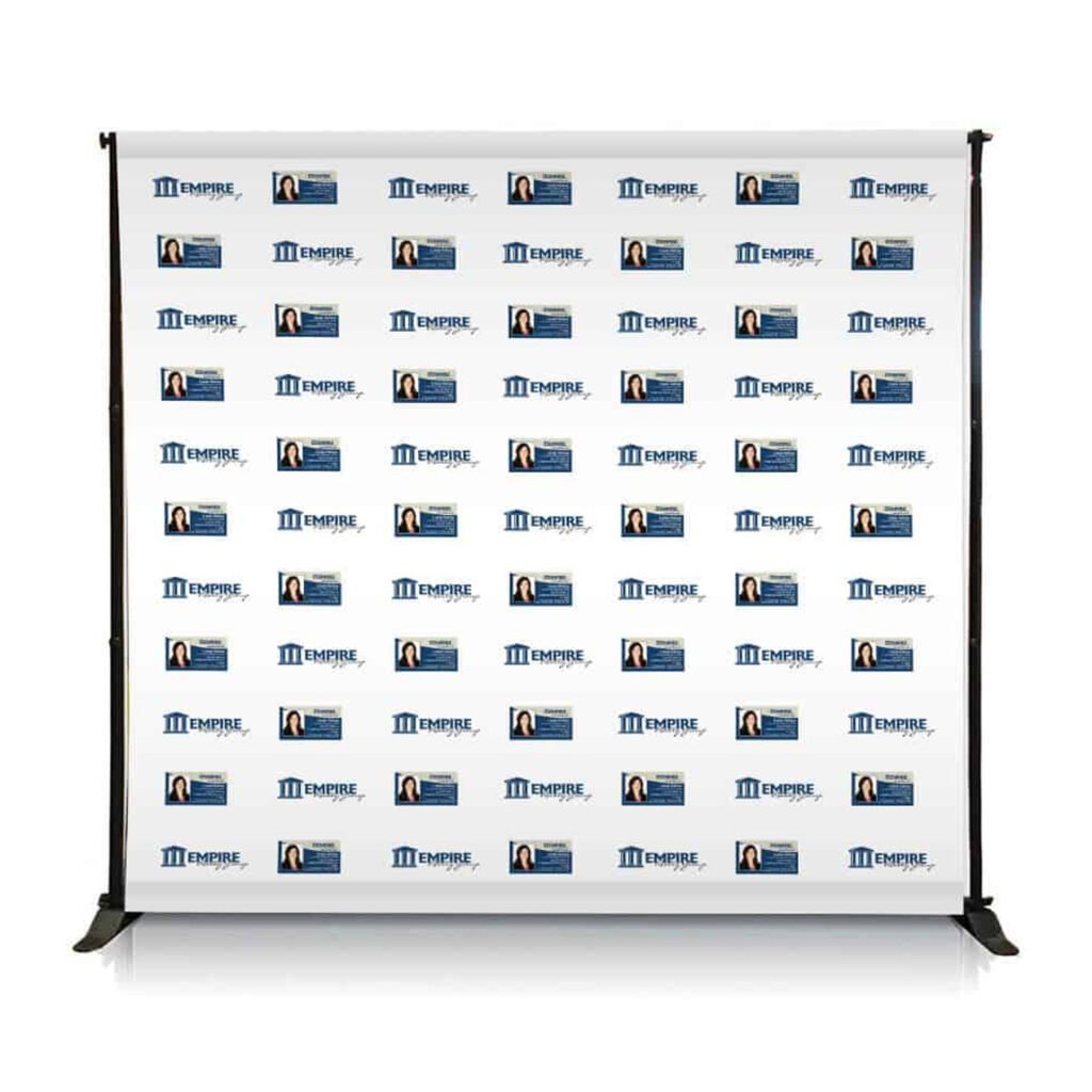 A step and repeat backdrop featuring a repeating pattern of a brand's logo, ideal for photo opportunities at events.